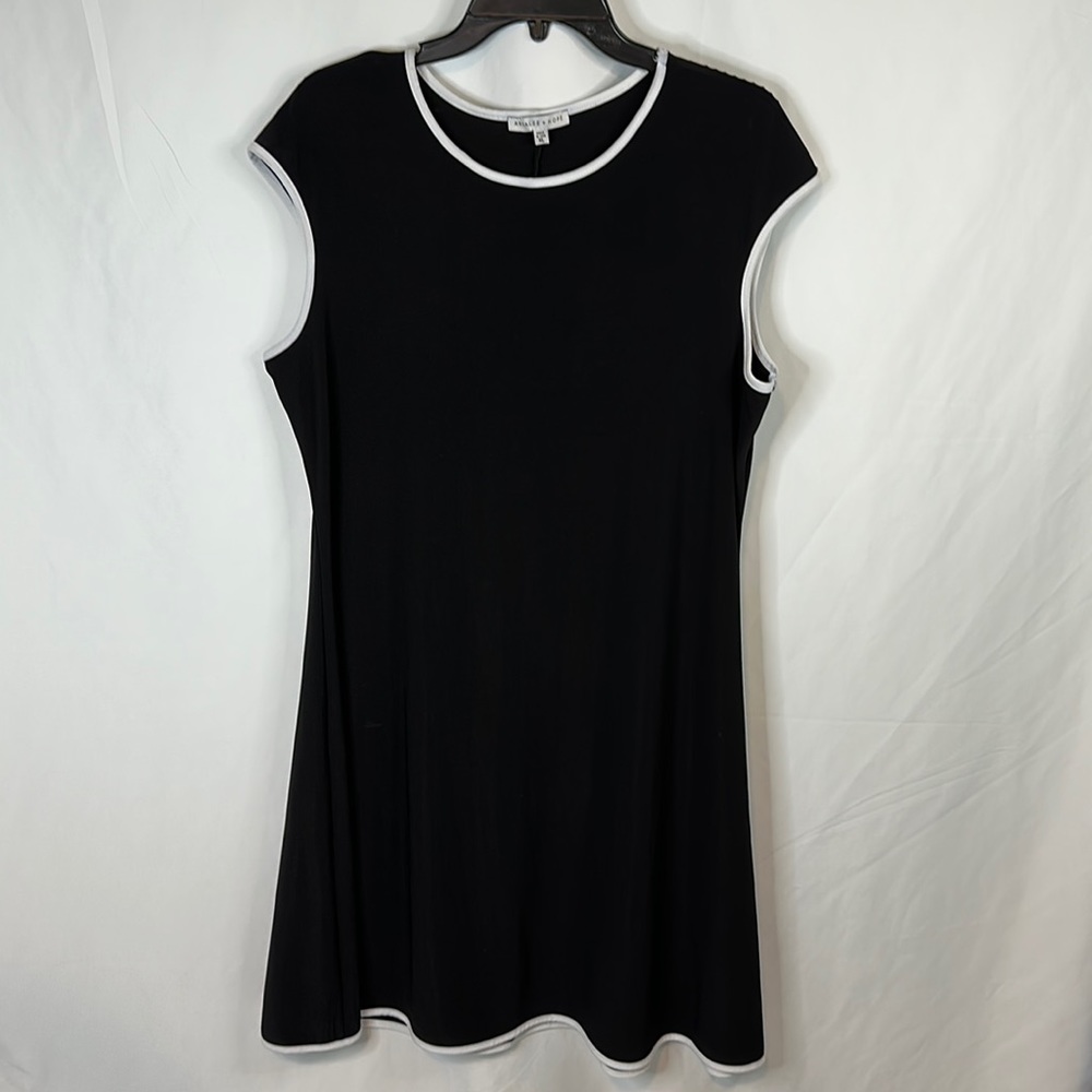 Black flared dress with white accents